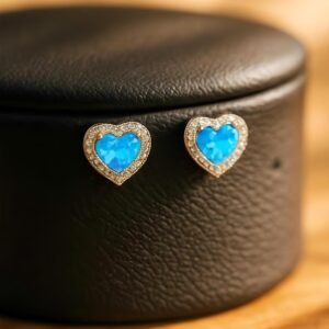Side angle of Silver CZ & Blue Opal Heart Stud Earrings