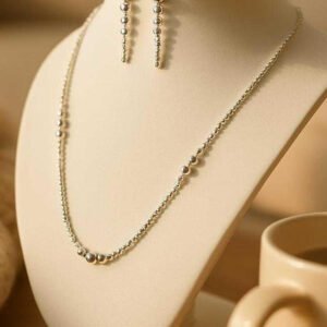 Close-up of elegant rhodium plated ball beads necklace from RAFYQ