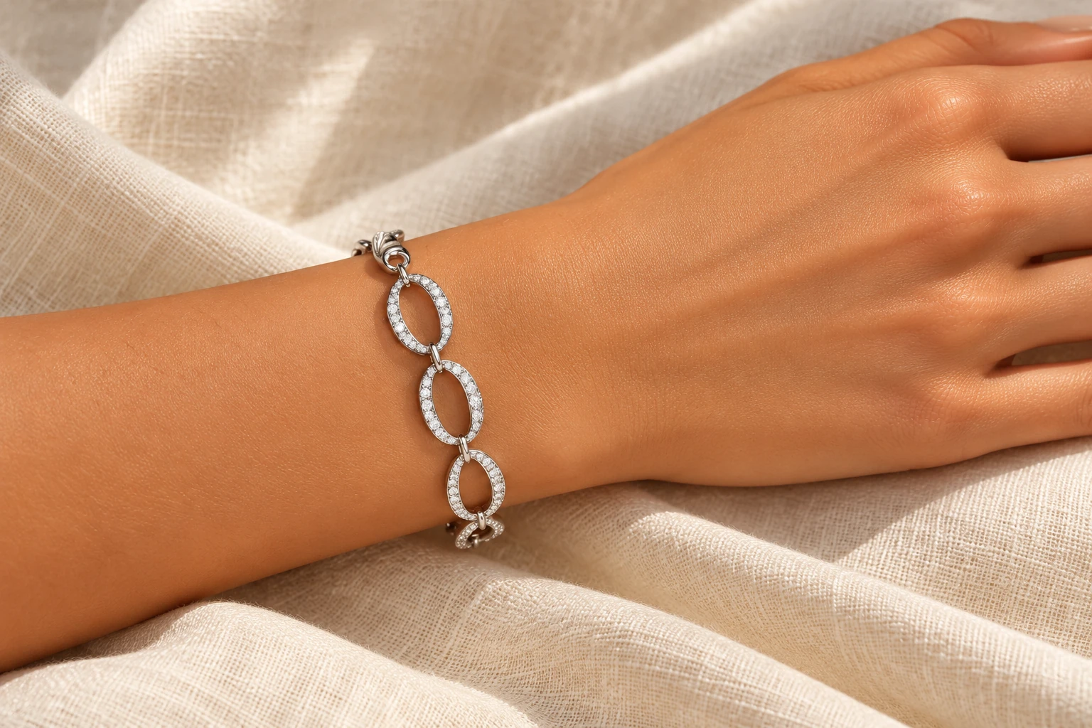 Brilliant Spark silver bracelet worn on a wrist